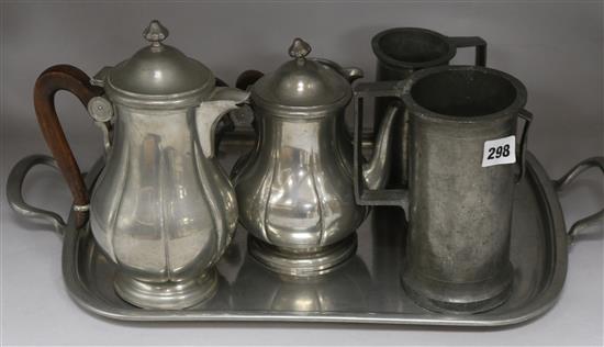 A set of French pewter mugs and 4 piece tea set